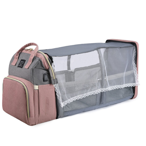 All - in - One Foldable Crib Diaper Bag • Mosquito Net & Toy Hanger
