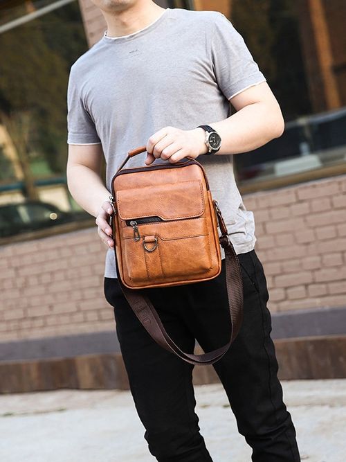 Desconto de 50% por tempo limitado  Sling bag masculino com capacidade grande, feito de couro de alta qualidade, pode ser usado sobre o ombro ou cruzado pelo corpo, exclusivo e de luxo para homens.