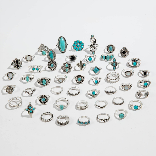 Latest trendy rings. A set of 45 rings: 15 in turquoise, 15 in silver, and 15 in gold. All 45 styles are randomly selected and shipped. Wholesale available.