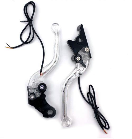 Brake and clutch lever set with a high-brightness LED strip moulded inside a see-through acrylic body. Standard 22 mm clamp, 165 mm blade, six-position reach dial. Bolts straight onto CG-series bikes.