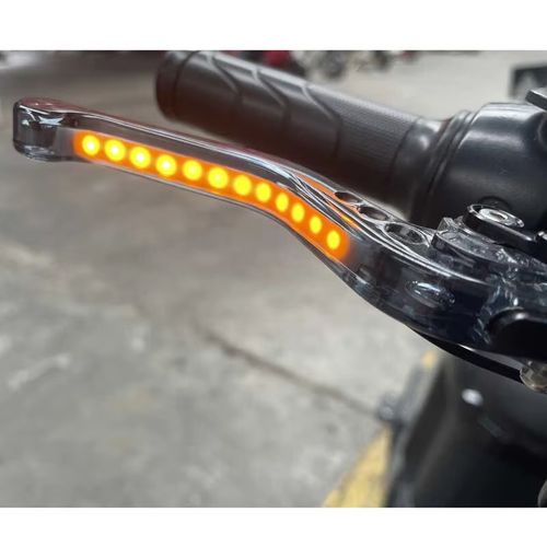 Brake and clutch lever set with a high-brightness LED strip moulded inside a see-through acrylic body. Standard 22 mm clamp, 165 mm blade, six-position reach dial. Bolts straight onto CG-series bikes.
