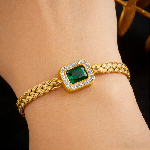 Fashionable women's gold jewelry set with green rhinestone pendant necklace, earrings, and bracelet as a gift.