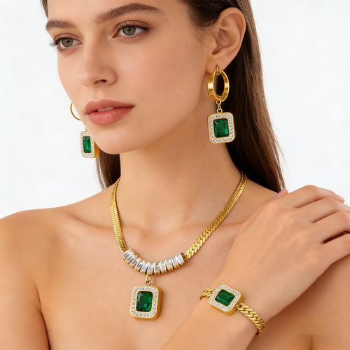 Fashionable women's gold jewelry set with green rhinestone pendant necklace, earrings, and bracelet as a gift.