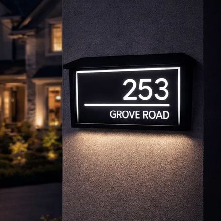 Individually designed, solar-powered LED backlit house number plate