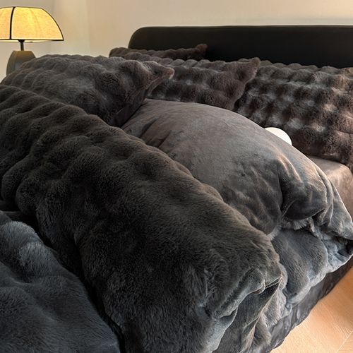 A four-piece flannel set on a bunny velvet bed