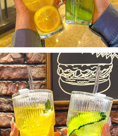 Premium style glass beverage cup   ideal for cold drinks and fruit juice   features a lid and straw, and is made of thickened, clear glass suitable for milk tea or cola.