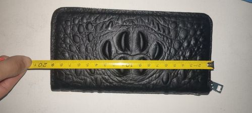 Unisex genuine leather zippered wallet with wrist strap: Features RFID-blocking technology and high-capacity storage, combining the functions of a personalized card holder, clutch, and phone pouch.