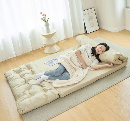 Relax in Style:Creamy Double Seater Folding Sofa Bed,Multi-Functional Lounger,Sleek and Washable Design,Make a Statement in Your Bedroom or Fashionable Patio