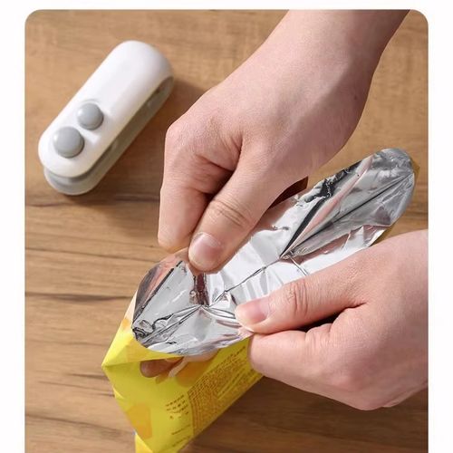 Portable USB Rechargeable Mini Vacuum Sealing Machine Household Use Plastic Bag Food Sealer