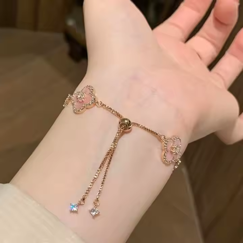 A luxurious retro style four-petal white, pink and red multi-colored crystal inlaid hollow adjustable length women's bracelet