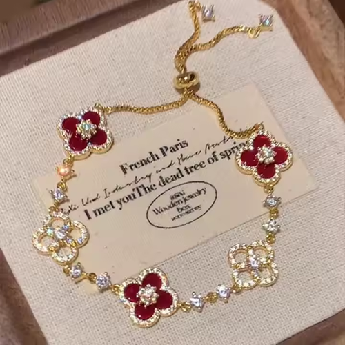 A luxurious retro style four-petal white, pink and red multi-colored crystal inlaid hollow adjustable length women's bracelet