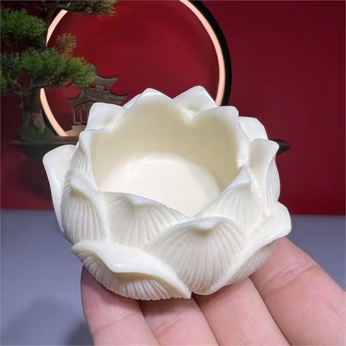The statue of the Buddha riding in a lotus boat, the car center console decoration piece, the new high-end interior decoration items, peaceful and grand, with a touch of traditional Chinese style.