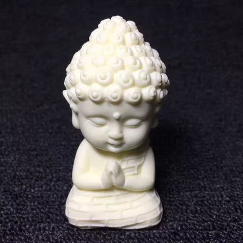 The statue of the Buddha riding in a lotus boat, the car center console decoration piece, the new high-end interior decoration items, peaceful and grand, with a touch of traditional Chinese style.