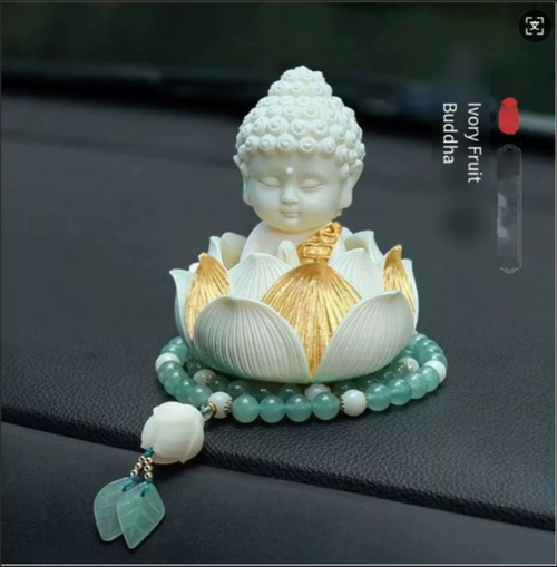 The statue of the Buddha riding in a lotus boat, the car center console decoration piece, the new high-end interior decoration items, peaceful and grand, with a touch of traditional Chinese style.