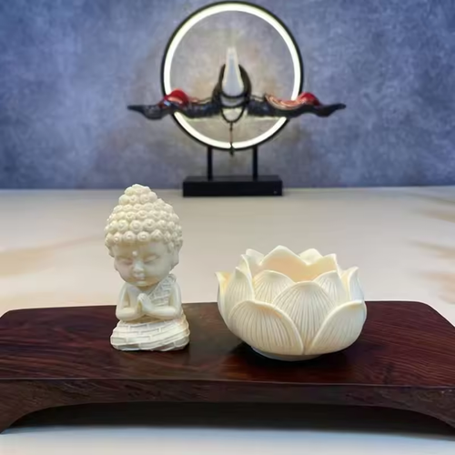 The statue of the Buddha riding in a lotus boat, the car center console decoration piece, the new high-end interior decoration items, peaceful and grand, with a touch of traditional Chinese style.