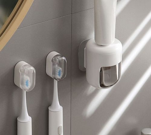 Automatic toothpaste squeezer wall-mounted punch-free toothbrush storage rack