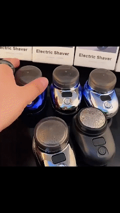 Mini electric shaver for men with digital battery level display.
