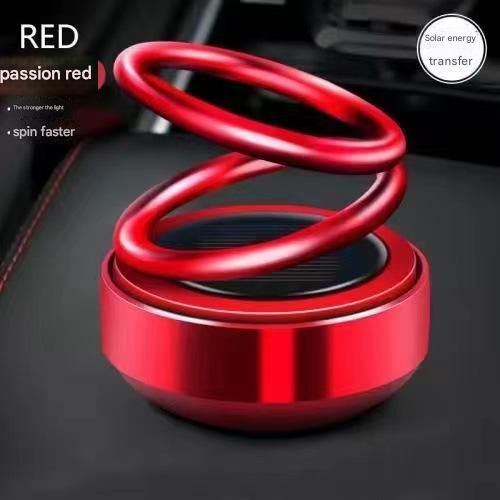 Solar-powered double-ring suspended rotating aromatherapy car air freshener with gradient lighting, long-lasting subtle fragrance, and decorative car interior ornament.