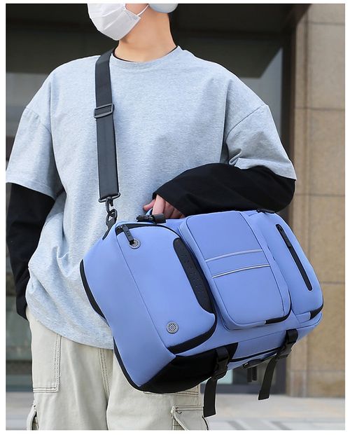 Business-style blue laptop backpack, waterproof material, large capacity design, suitable for all users.