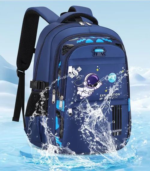 🔥🔥Soldes d'été : Sac à dos scolaire astronaute cartoon tendance neuf en tissu Oxford, sac d'école primaire allégeant la charge, imperméable🔥