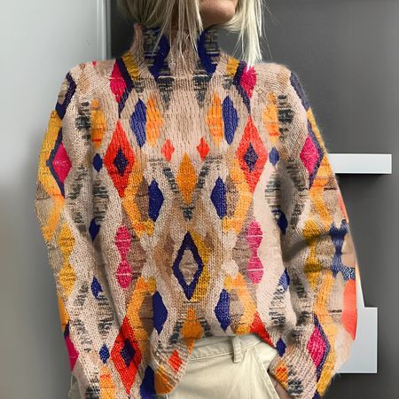 Geometric checked mesh sweater