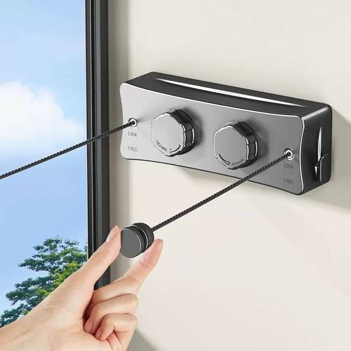 Invisible clothesline, no drilling required, retractable clothes drying device for indoor use on balconies.