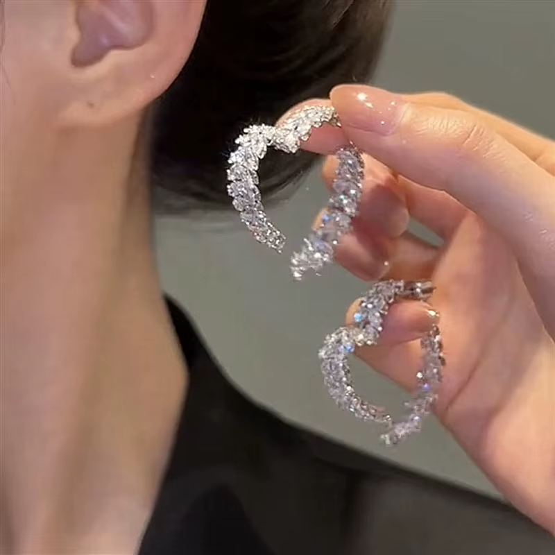 New design luxurious cubic zirconia flower stud earrings with leaf-shaped design, wearable on both sides.