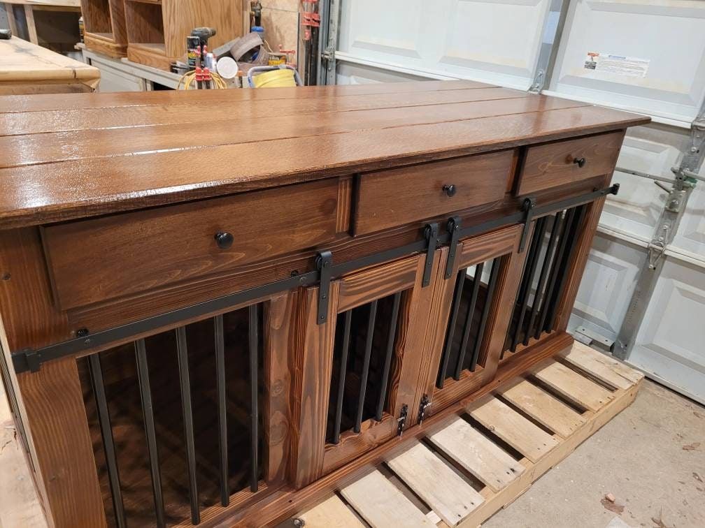 Double Dog crate with drawers, divider an double barn doors.