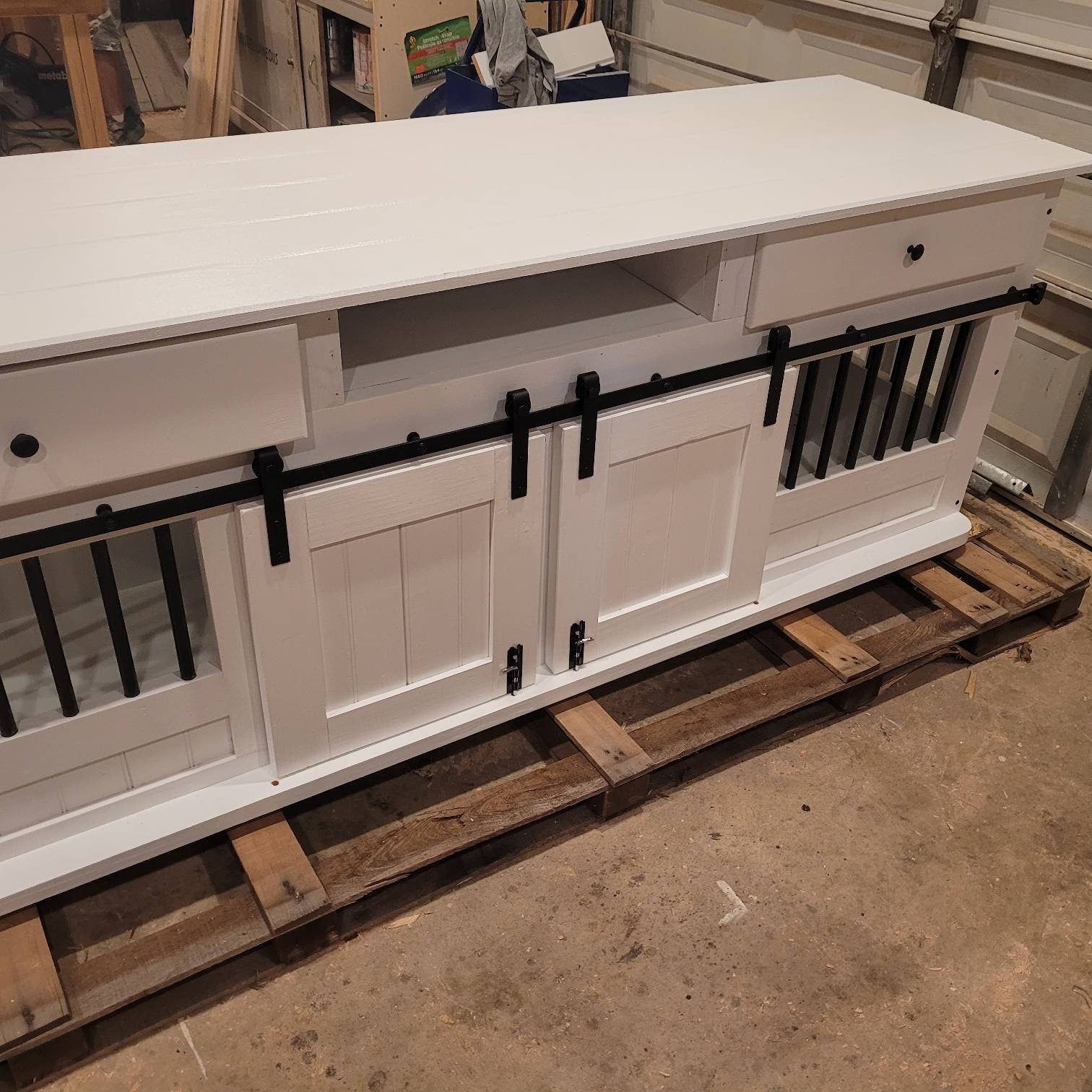 Custom double Dog crate with drawers, space in middle for cable box,solid divider and double solid barn doors.