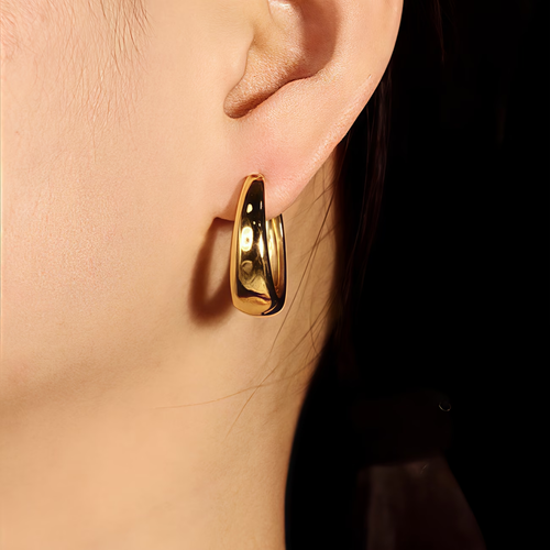 Golden oval-shaped lady's earrings