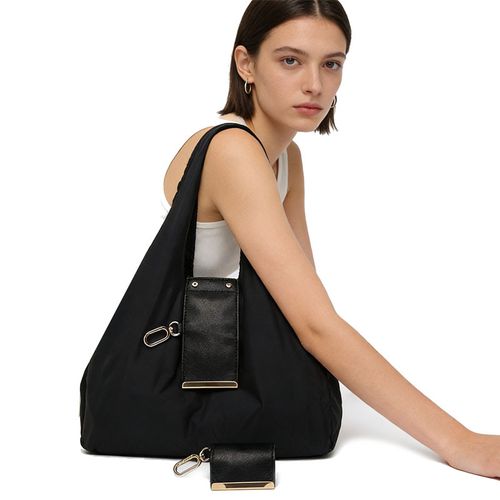 Large-capacity, portable nylon shopping bag—eco-friendly, suitable for hand or shoulder carry.