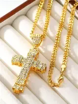 Pingente de cruz dourada