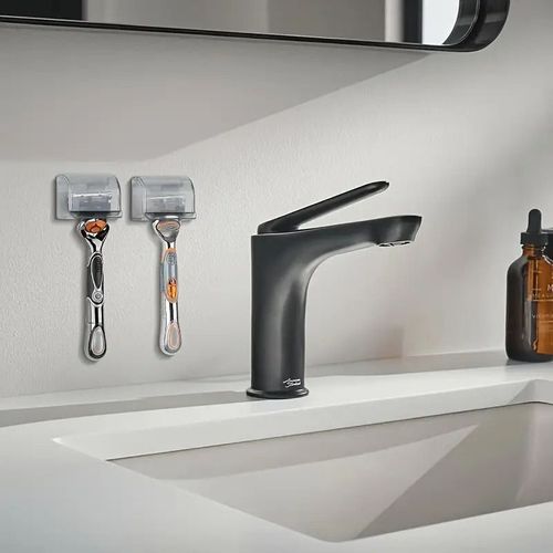 Wall-mounted razor holder