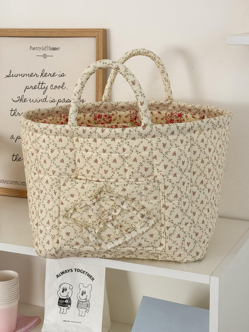 Floral pattern laundry basket, stylish and lightweight storage box.