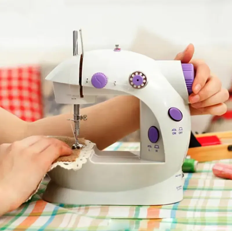 18 🔥💯🏹 Household Small Mini Sewing Machine Household Mini Electric Desktop Multi-Function Automatic Sewing Machine.💫😎👉
