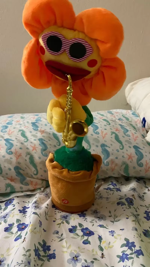 An electric sunflower that dances while playing the saxophone
