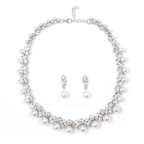 Women's romantic Baroque-style jewelry set, featuring exquisite diamonds and natural pearls, including necklace and earrings. Perfect for evening galas and versatile for various occasions.