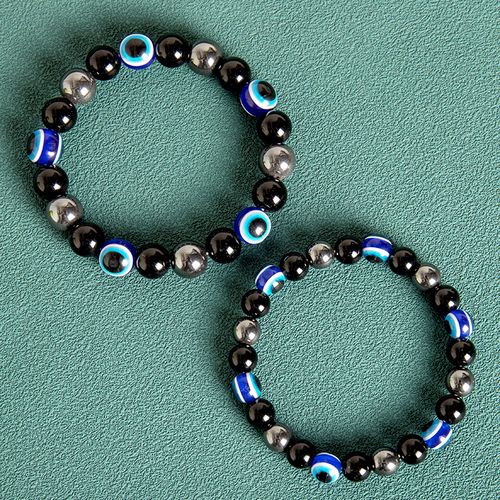 Black Bead Bracelet with Blue Eye Motifs