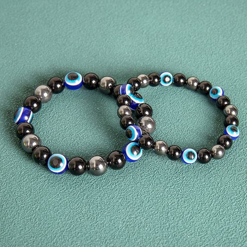 Black Bead Bracelet with Blue Eye Motifs