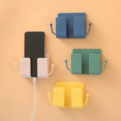 Hot selling bedside rack wall mounted storage box mobile phone holder sticky mobile phone charging holder remote control storage box