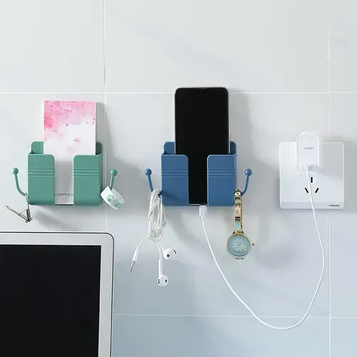 Hot selling bedside rack wall mounted storage box mobile phone holder sticky mobile phone charging holder remote control storage box