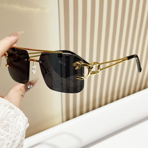 European and American style frameless sunglasses with leopard head design for men and women, sports glasses.