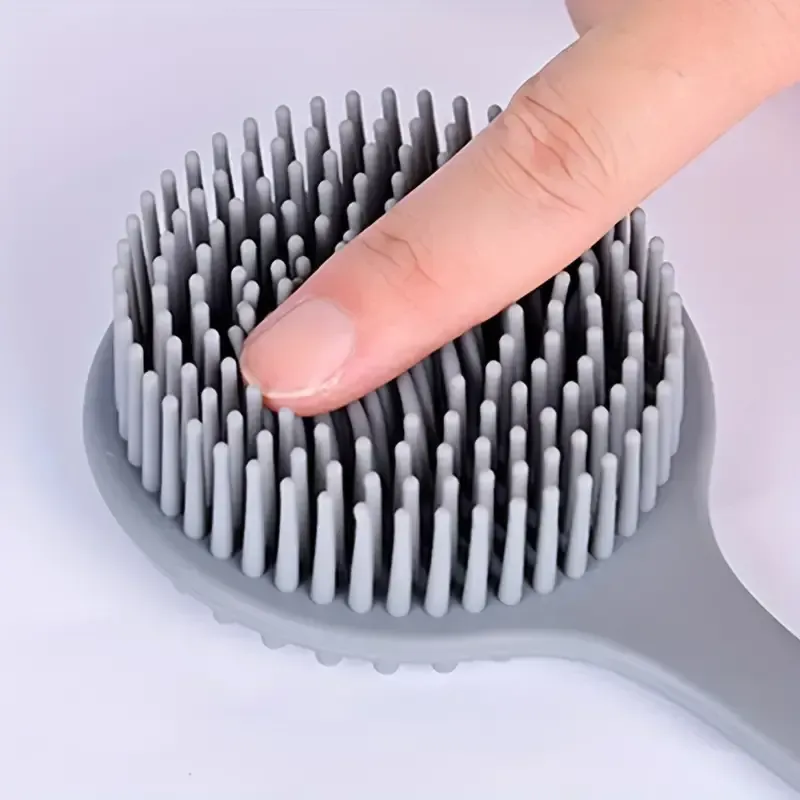 63 Brosse de massage à long manche
