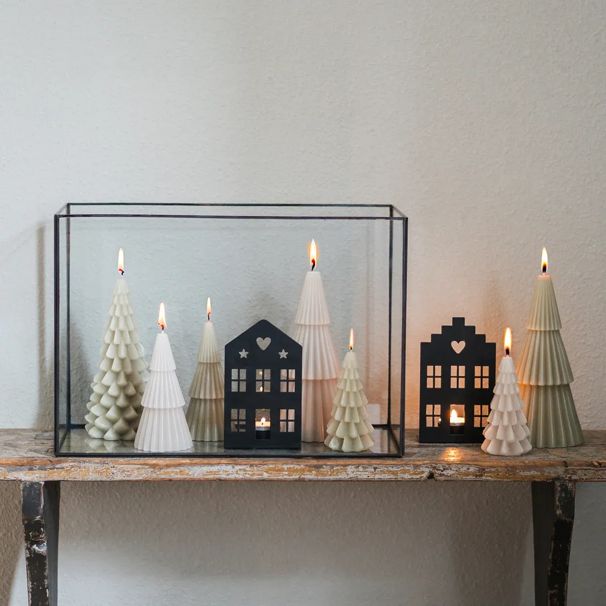 Modern glass tray with cozy Christmas tree candles