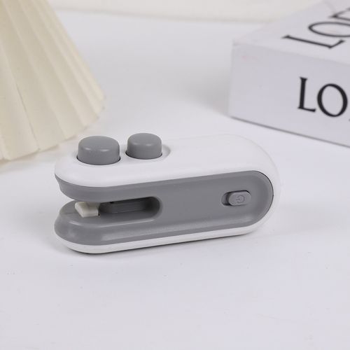 Mini hand pressed plastic bag sealing artifact